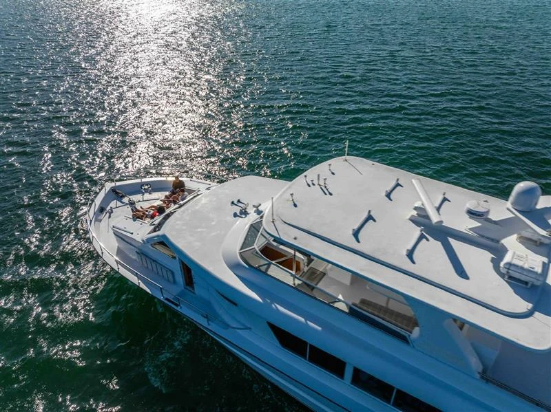 Guests enjoying a sunset cruise aboard a private yacht